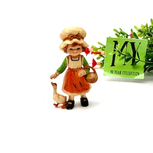 Adorable Vintage Young Girl Holding Basket with Goose Figurine Hong Kong My40YearCollection