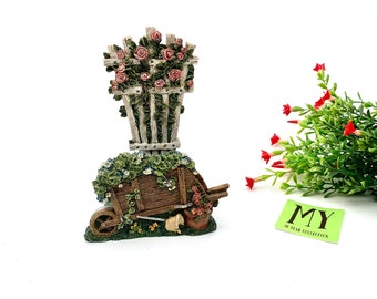 Servilletero de resina vintage: decoración floral con forma de carretilla