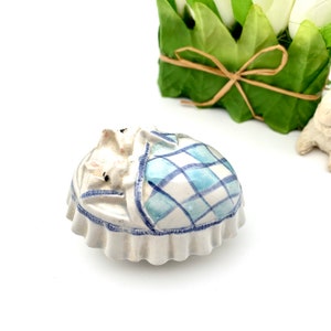 Vintage Pottery Easter egg Blue and White Two Bunnies Under Blanket Signed Easter Decor Collectible