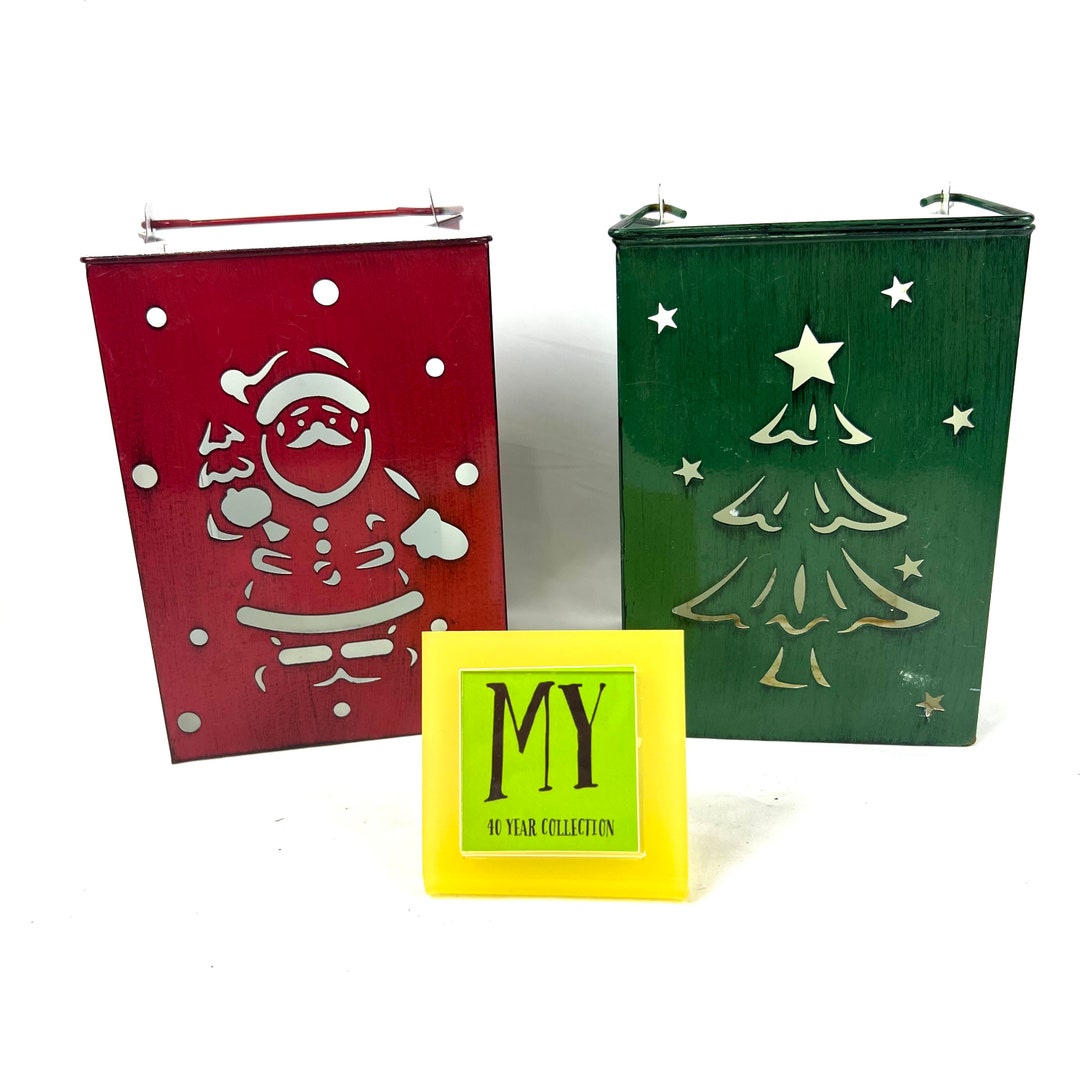 Vintage Pair of Metal Christmas Candle Holders Cut Out Santa and