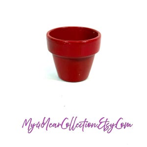 May include: A small, red ceramic flower pot with a slightly flared rim. The pot is empty and sits against a white background. The Etsy shop name "My4YearCollection.Etsy.Com" is written in purple script at the bottom.