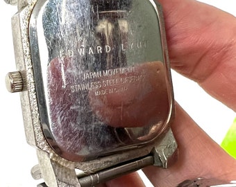 Montre blanche à cadran rond argenté