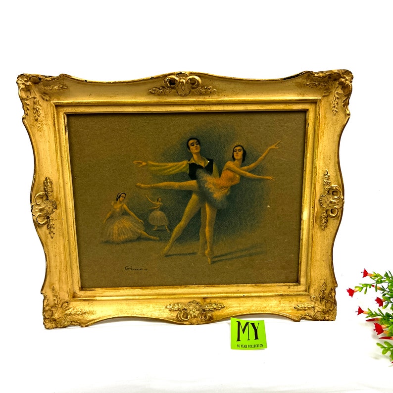 May include: A framed vintage print of a ballet performance. The print features four dancers in a soft, muted color palette. The frame is gold with ornate detailing.