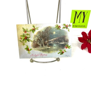 Stara pocztówka - Radosne Boże Narodzenie - Księżyc oświetlony nad jeziorem - Rama Holly Berry Opublikowano w 1907 r. Znaczek Benjamina Franklina - My40YearCollection