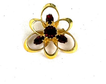 Vintage Gold Tone Flower Brooch with Red Garnet Rhinestones