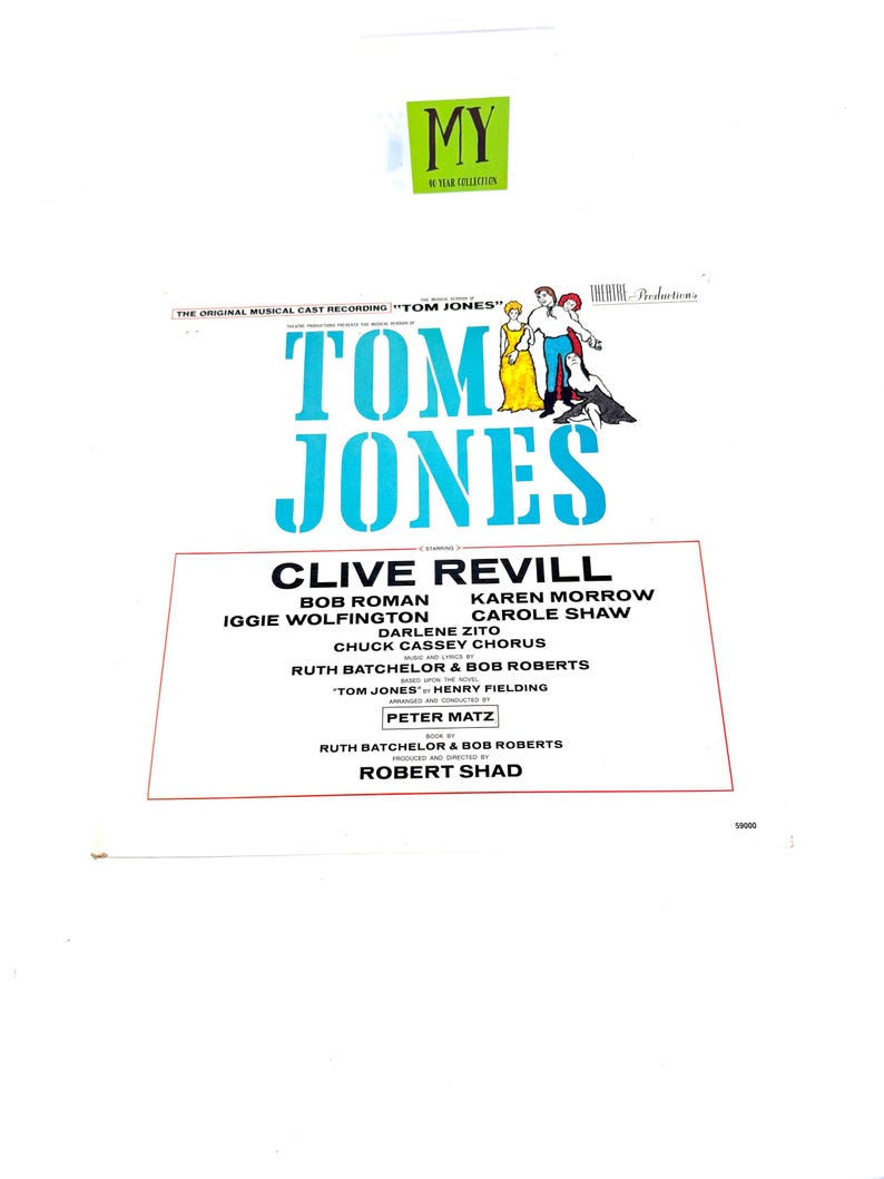 Puede incluir: Una grabaci&oacute;n de reparto musical vintage de "Tom Jones" con un t&iacute;tulo turquesa y los nombres del elenco. La portada presenta los nombres de Clive Revill, Karen Morrow y Carole Shaw. La imagen incluye una peque&ntilde;a ilustraci&oacute;n de personajes con ropa de &eacute;poca.