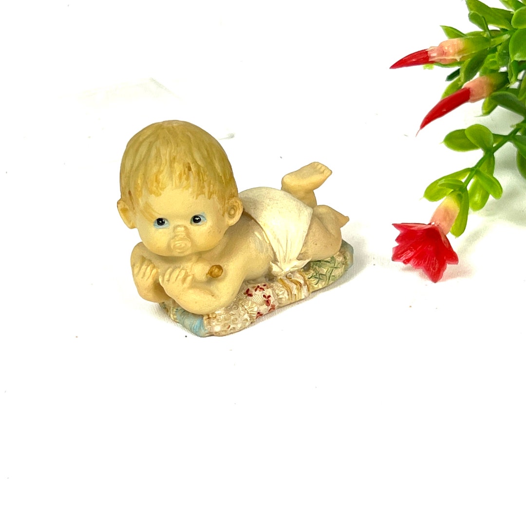 Vintage Baby Figurine Baby in Diaper With Pacifier Holding Bottle Resin