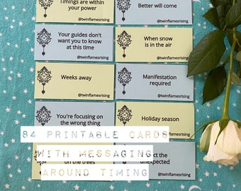 May include: A collection of 84 printable cards with messages about timing. The cards are in light blue and yellow, with a clock design and text like "Timings are within your power." A white rose is in the corner.