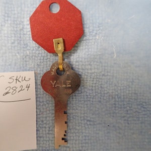 Yale & Towne 21 9M 499 Series key 2 1/8&quot; Long with Red Tel-Kee  Key Tag # 386
