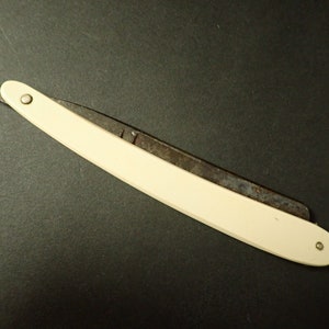 Antique Straight Razor Geneva Cutlery Co. Geneva NY USA  Good Used Condition Celluloid Handle Needs Cleaning