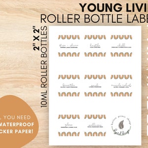 Może przedstawiać: Drukowane etykiety na butelki roll-on Young Living. Etykiety mają wymiary 5,08 cm x 5,08 cm i są przeznaczone do butelek roll-on o pojemności 10 ml. Etykiety mają tęczowy wzór i zawierają frazy takie jak "Rise + Shine", "Breathe" i "Glow". Tekst "All you need is waterproof sticker paper!" jest również zawarty.