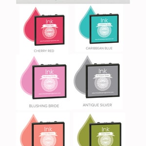 May include: Image of six ink pads in various colors: Cherry Red, Caribbean Blue, Blushing Bride, Antique Silver, Coral Beach, and Grass Green. Each pad is square with a black frame and a color-matched ink drop graphic.