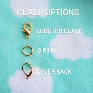 May include: Three gold-colored clasps: a lobster clasp, an O ring, and a lever back clasp. Clasp Options text is at the top of the image.