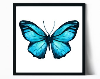May include: A framed watercolor painting of a blue butterfly with its wings spread open. The butterfly is centered on a white background.