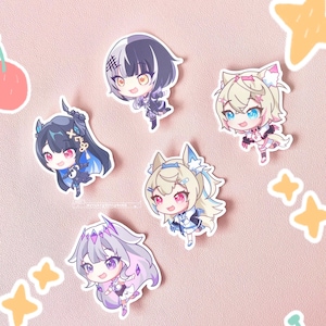 May include: Five colorful anime-style character stickers with different hair colors and outfits. The stickers are on a pink background.