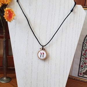 Mini cross stitch necklace with double knife pattern on adjustable waxed cotton cord bloody horror