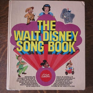 Das Walt Disney Songbuch 1979 - Ein goldenes Deluxe-Buch - Hardcover-Buch mit Liedern aus 17 verschiedenen Disney-Filmen + weiteren Favoriten