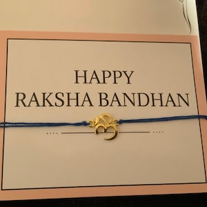 Filo d'oro Aum rakhi blu