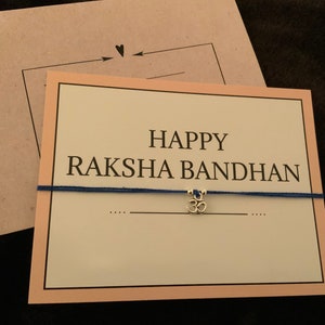 Rakhi blu Om argento + biglietto con busta abbinata