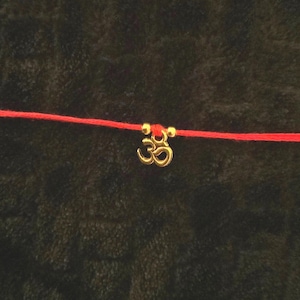 Regalo in oro antico aum rakhi / Aum rakhi / rakhis / raksha bandhan