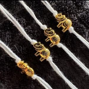 4x Hathi rakhi / prezent raksha bandhan / rakhi ze złotego słonia