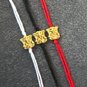 3x Ganesh Rakhis (gold)