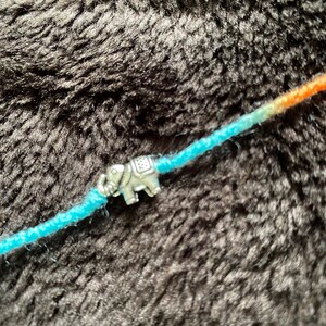 Hathi elephant rakhi on colourful vibrant thread