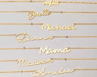 May include: Seven gold necklaces with different names written on them. The names are Sofia, Brielle, Michael, Diana, Mama, Madison, and Amelia.