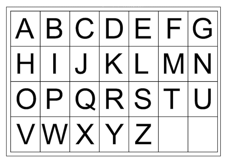 May include: A black and white alphabet chart with the letters A through Z arranged in a grid.