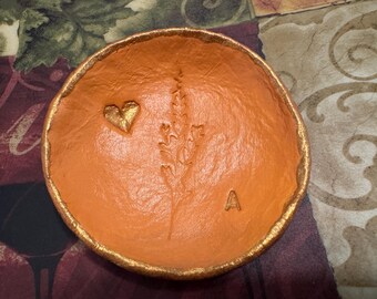 Handmade clay jewelry trays with origami heart and flower. Personalizable with first initial.