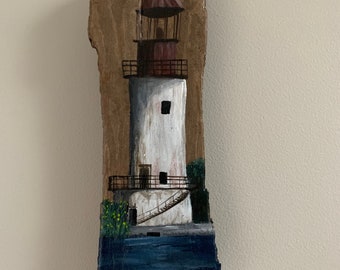 Gorgeous Lighthouse nautical wall decor perfect for any coastal home or beachy decor.  Hand painted on driftwood from Connecticut shoreline.