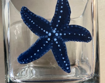 Beautiful starfish candle holder is stunning in any coastal decor or beach theme.