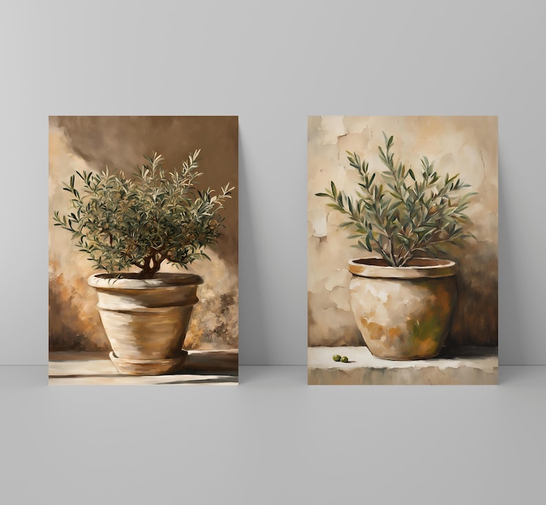 May include: Two paintings of olive trees in terracotta pots against a beige background. The olive trees have green leaves and are in a simple, rustic style.