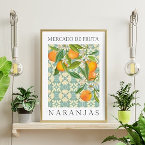 May include: A poster with a blue and white tiled background featuring a branch of orange trees with ripe oranges and white blossoms. The text "MERCADO DE FRUTA NARANJAS" is printed in black at the top and bottom of the poster.