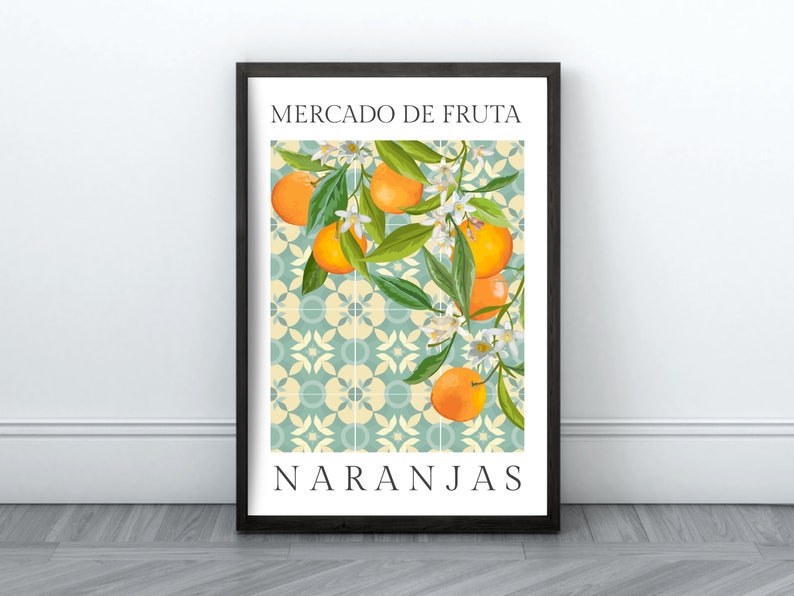 May include: A framed poster with a blue and white tiled background featuring a branch of orange blossoms and oranges. The text "MERCADO DE FRUTA NARANJAS" is printed in black at the top and bottom of the poster.