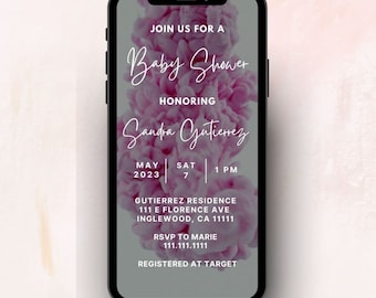 May include: A smartphone displays a baby shower invitation. The invitation features the text "Join us for a Baby Shower Honoring Sandra Gutierrez" in elegant script. The date is May 7, 2023, at 1 PM. The background has a pink floral design.