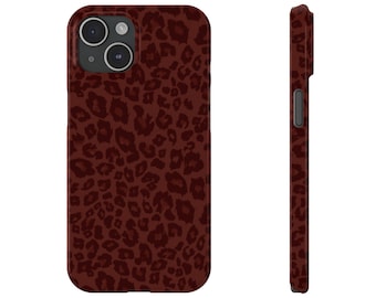 May include: A smartphone case featuring a dark maroon and brown leopard print pattern. The case includes a dual-camera cutout in the upper left corner and a side profile view showing the button placement and the consistent animal print design.