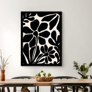 May include: Black and white floral print art with a modern abstract design. The print features large, stylized flowers and leaves.