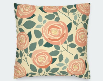 May include: A cream-colored pillow with a floral pattern featuring pink roses and green leaves.