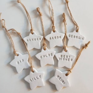 Personalised Clay White STAR Gift Tag, Christmas Tree Name Decoration, Wedding Favours, Handmade Name Tag, hung on a hemp