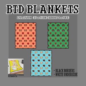 May include: Blankets with various patterns are displayed. One blanket is orange with brown cat faces and red hearts. Another is green with brown cat faces and red hearts. A third is blue with cat faces and red hearts. The blankets are 47 x 59 inches.