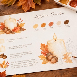 May include: A watercolor painting tutorial sheet titled Autumn Candle featuring step-by-step instructions, a color palette with yellow ochre, burnt sienna, raw sienna, beige, and burnt umber, and illustrations of a lit candle surrounded by autumn leaves.
