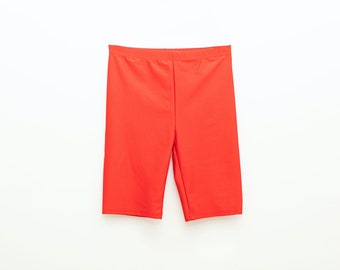 red shiny biker shorts