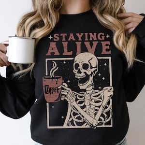 Staying Alive Coffee Sweatshirt, Trendy Sweatshirt, Funny Skeleton Sweatshirt, Halloween Retro Sweater for Women Stay Oversized Crewneck