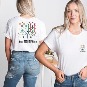 a woman wearing a t - shirt with a design on it