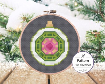 Vintage-Style Christmas Ornament cross stitch pattern. Green Indented Christmas-ball ornament with pink detail.