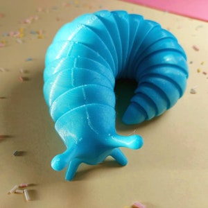 Friendly Articulated Slug. Flexible slug toy. Fidget toy for all ages. 3D printed toy. 3D printed desk toy. Desk accessory. Small gift