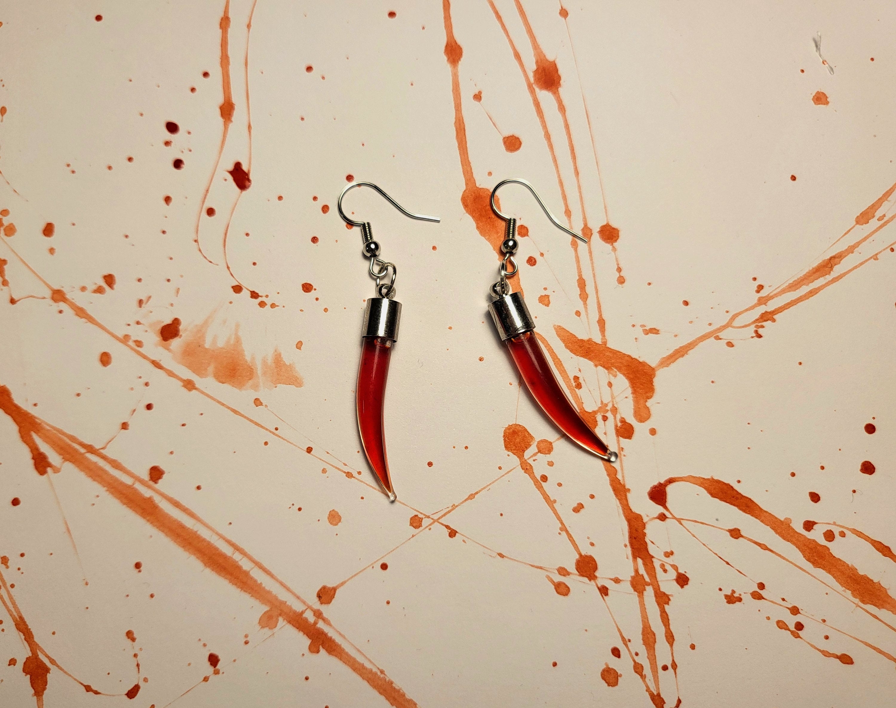 Dragon fang earrings deals