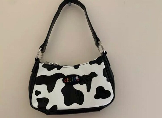 delias cow print purse