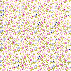 May include: A white fabric with a repeating pattern of small pink and blue flowers with green stems.